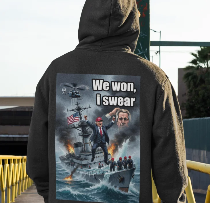 model wearing black hoodie with anti-trump design