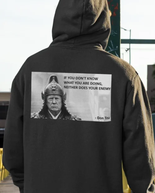 model wearing black hoodie with anti-trump design